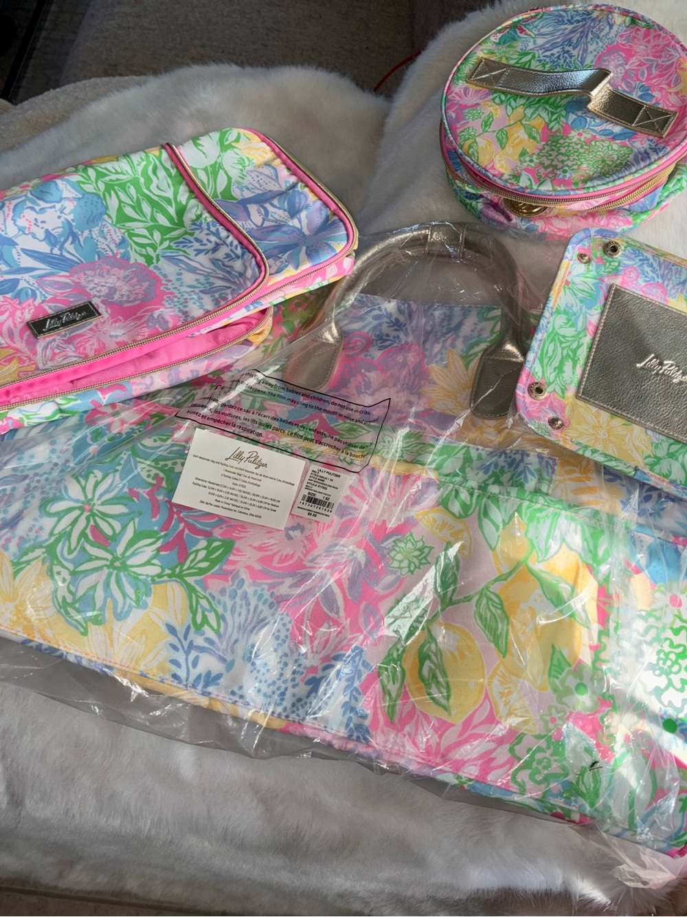 Lilly Pulitzer Pastel Floral Travel Bag Set in Pink, Green, Blue, Yellow